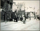 1900c - High Street - Reverend Kelly on a Velocipede or Bone Shaker