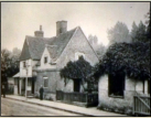 1900c -Toll House Cottages looking North along the High Street to the  pond in in the background